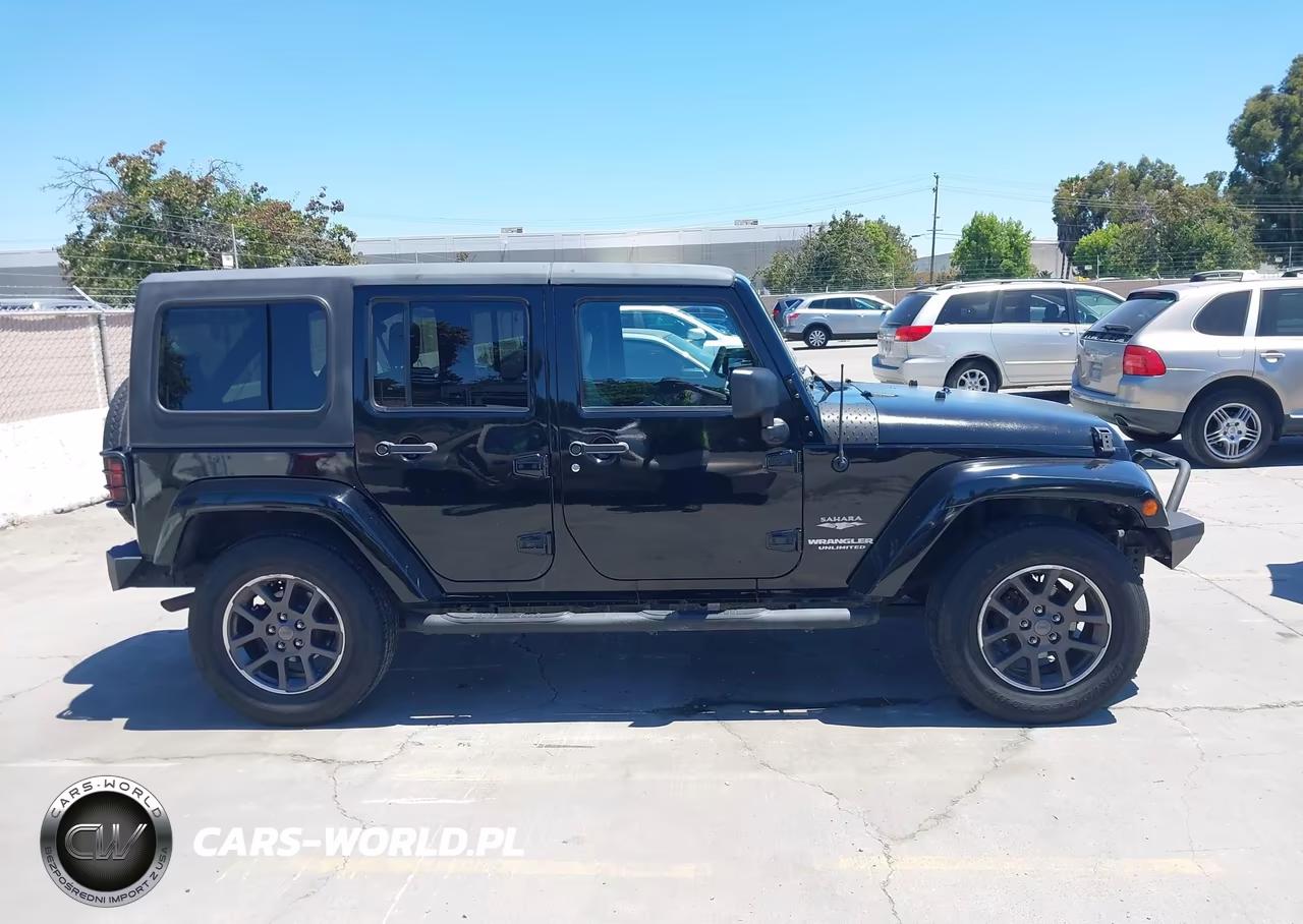 2007 Jeep Wrangler Unlimited Sahara VIN:1J4GA59167L196825 - 13
