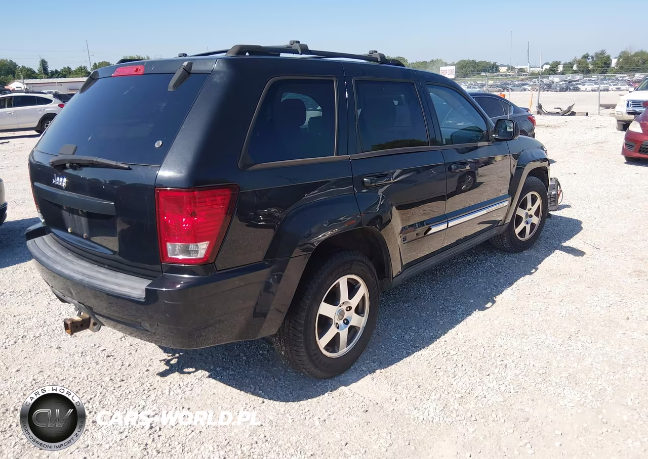 2009 Jeep Grand Cherokee Laredo VIN:1J8GR48K09C552233 - 4