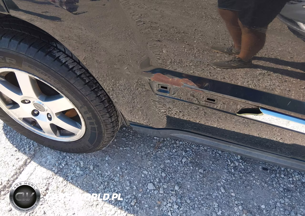 2009 Jeep Grand Cherokee Laredo VIN:1J8GR48K09C552233 - 6
