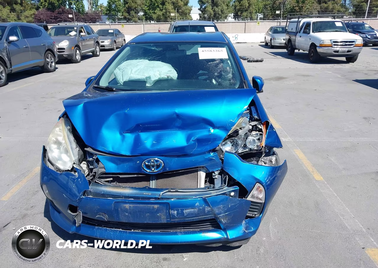 2013 Toyota Prius C Two VIN:JTDKDTB3XD1547329 - 12