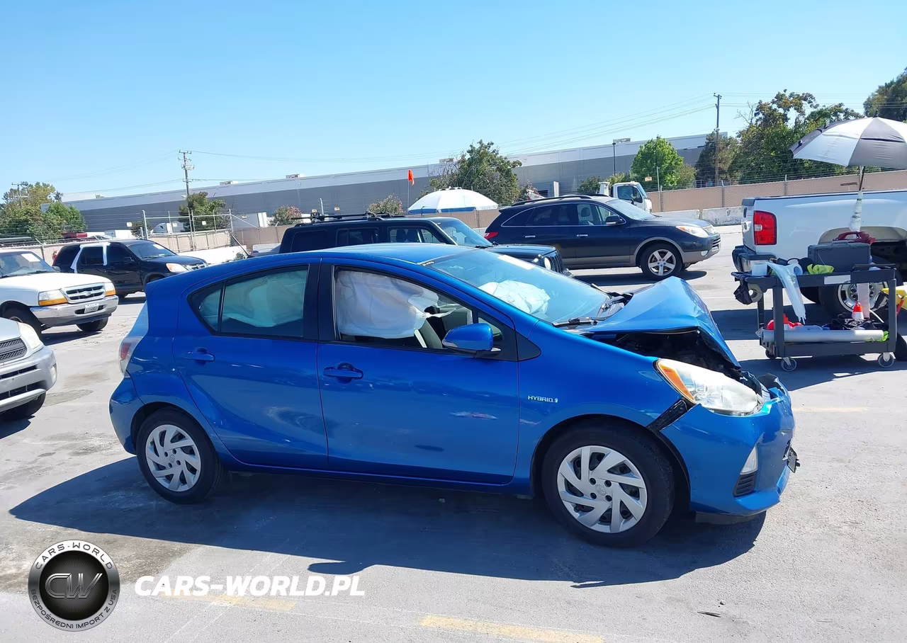2013 Toyota Prius C Two VIN:JTDKDTB3XD1547329 - 13