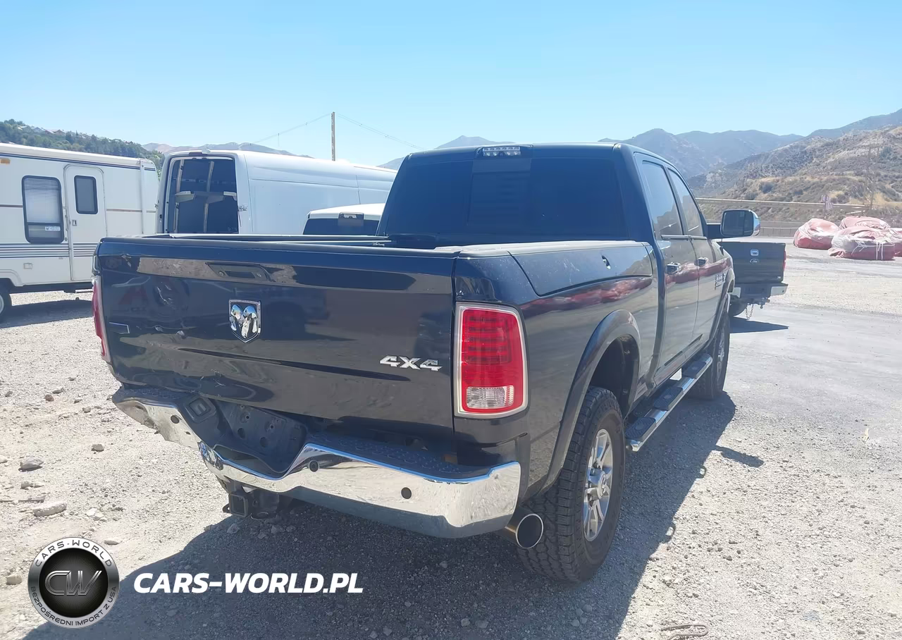 2014 Ram 2500 Laramie VIN:3C6UR5FL5EG165123 - 4