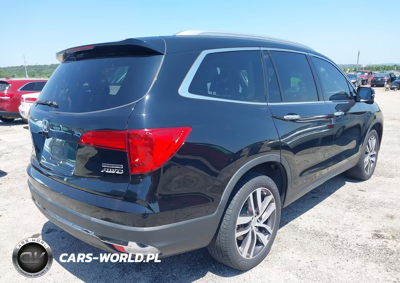 2017 Honda Pilot Touring VIN:5FNYF6H95HB101572 - 4