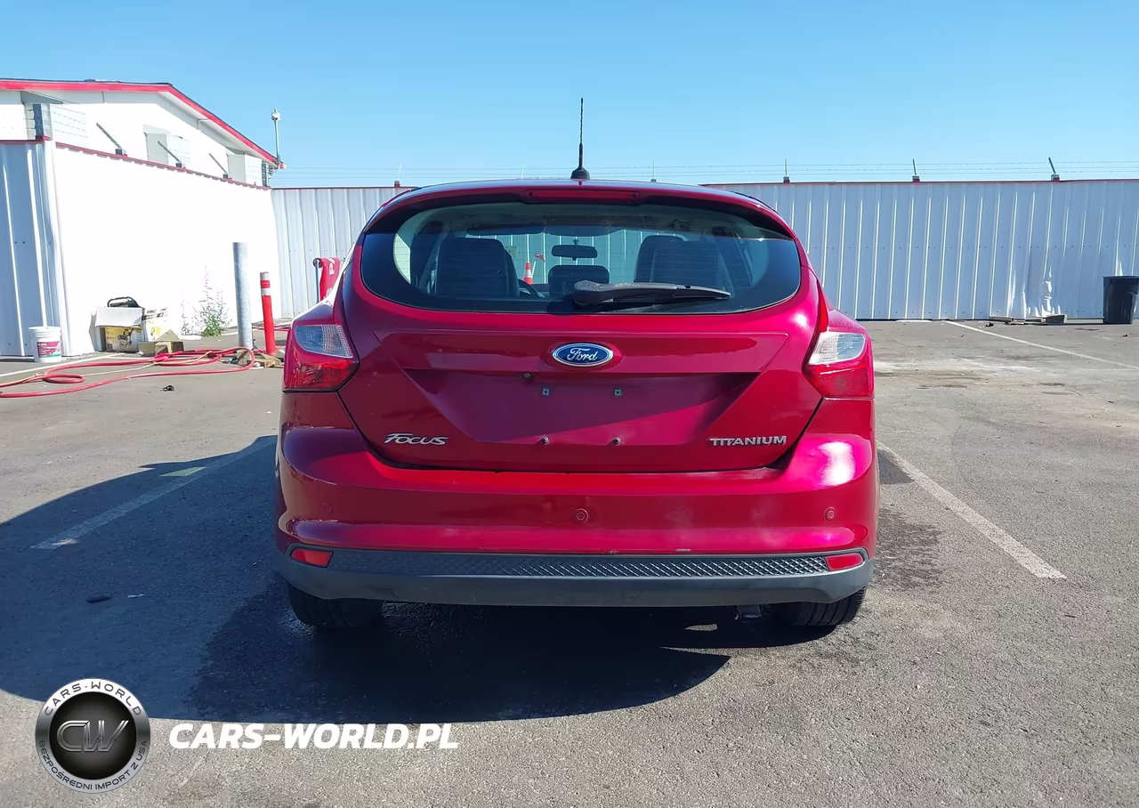 2013 Ford Focus Titanium VIN:1FADP3N26DL382814 - 16