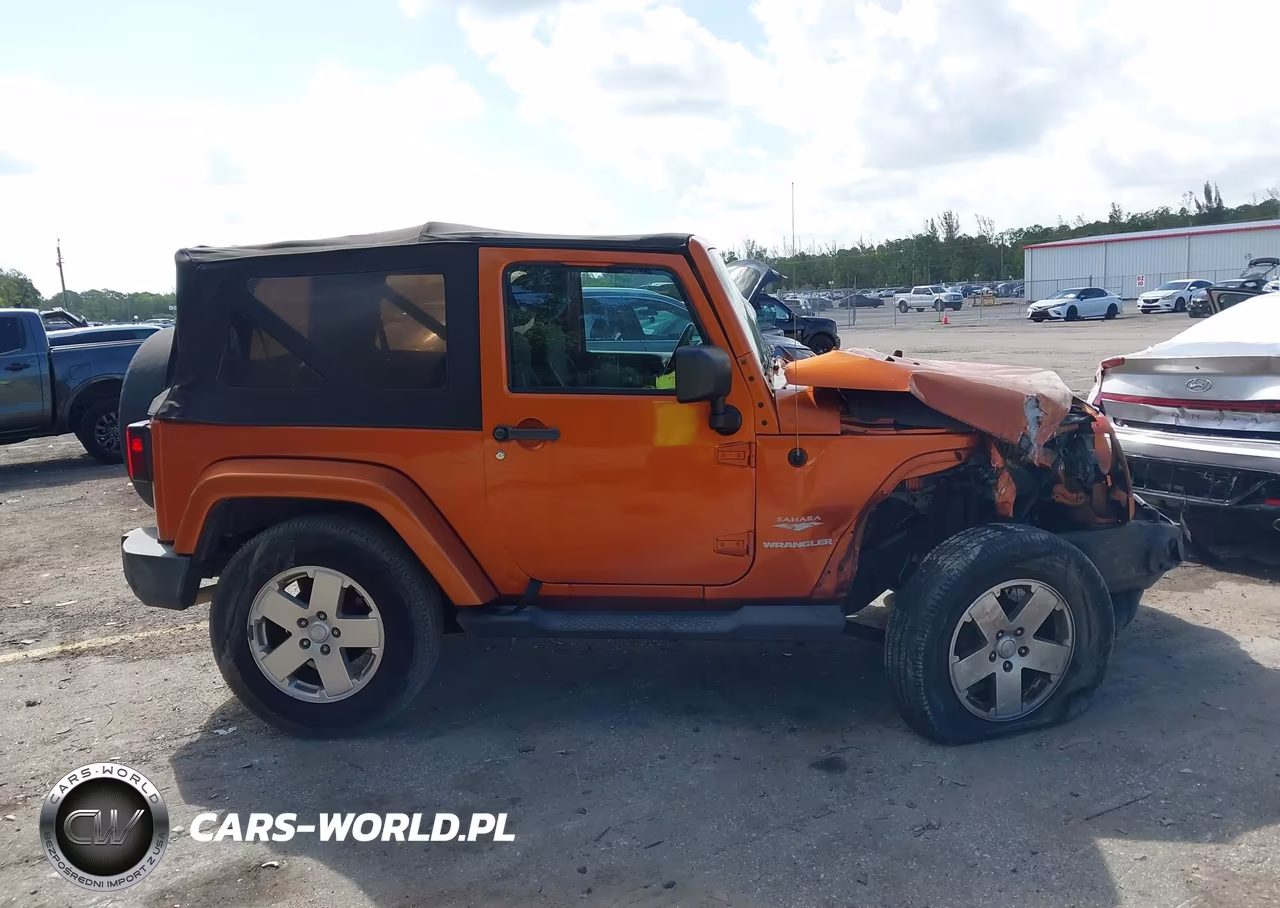 2011 Jeep Wrangler Sahara VIN:1J4AA5D16BL606349 - 13