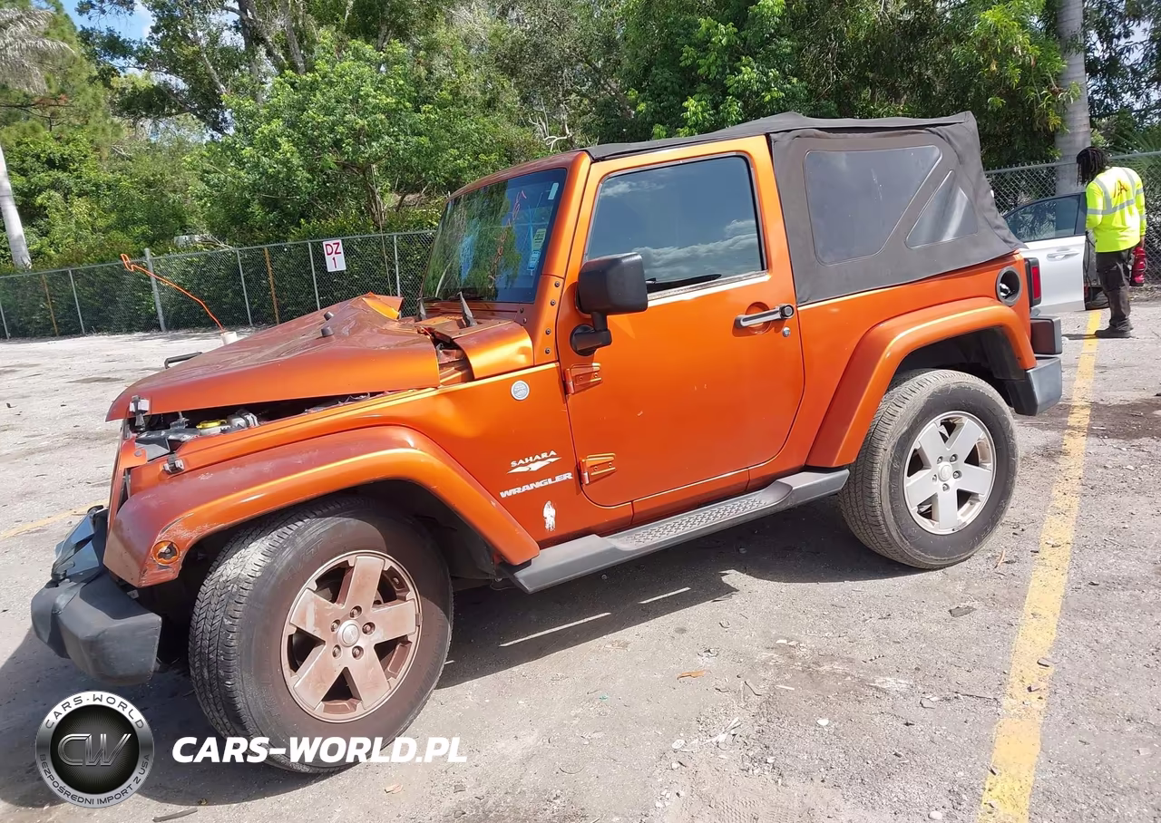 2011 Jeep Wrangler Sahara VIN:1J4AA5D16BL606349 - 2