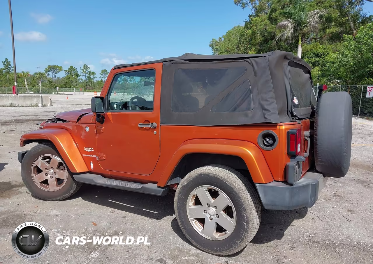 2011 Jeep Wrangler Sahara VIN:1J4AA5D16BL606349 - 3