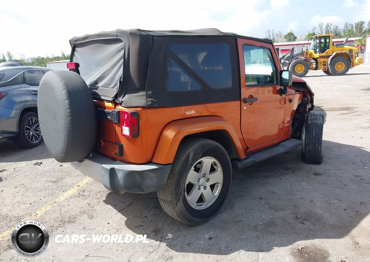 2011 Jeep Wrangler Sahara VIN:1J4AA5D16BL606349 - 4