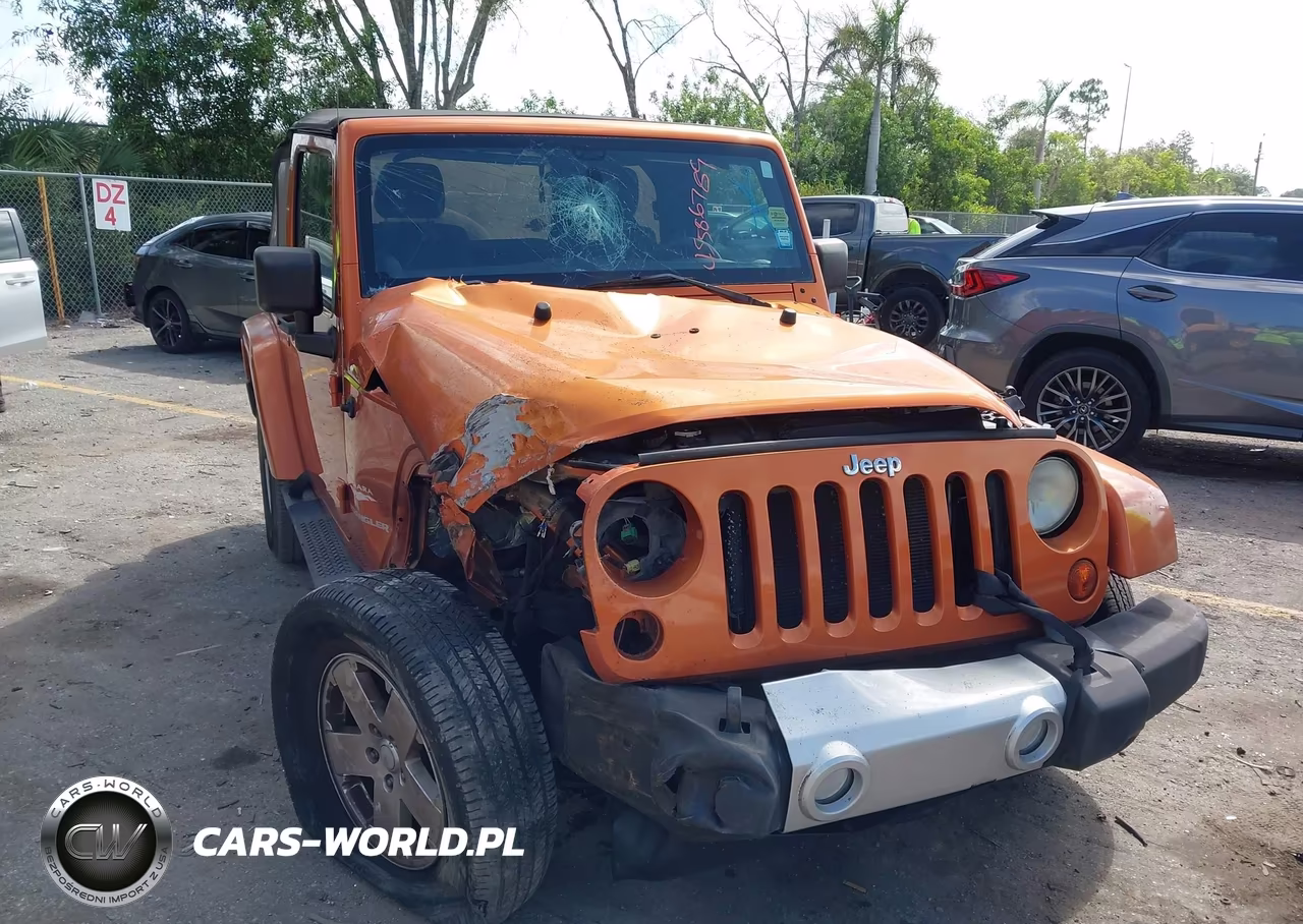 2011 Jeep Wrangler Sahara VIN:1J4AA5D16BL606349 - 6