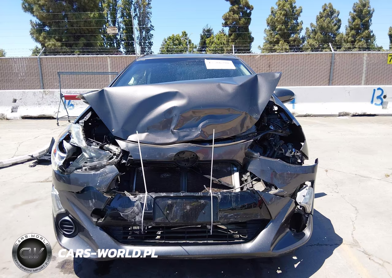 2015 Toyota Prius C Three VIN:JTDKDTB3XF1097409 - 13