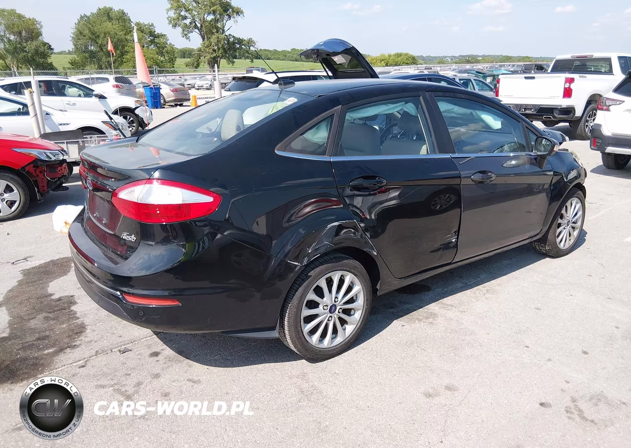 2017 Ford Fiesta Titanium VIN:3FADP4CJ3HM129664 - 4
