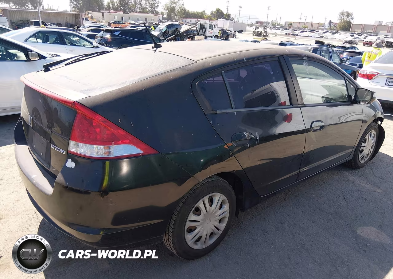 2011 Honda Insight Lx VIN:JHMZE2H57BS006677 - 4