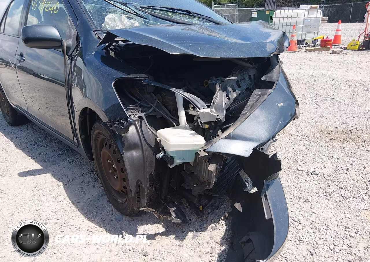 2011 Toyota Yaris VIN:JTDBT4K34BL000860 - 18