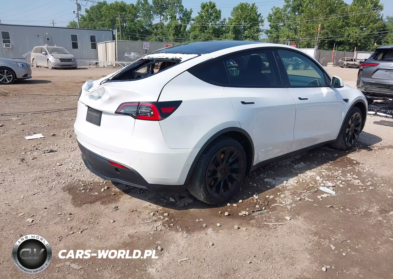 2021 Tesla Model Y Standard Range Rear-Wheel Drive VIN:5YJYGDED2MF105910 - 4