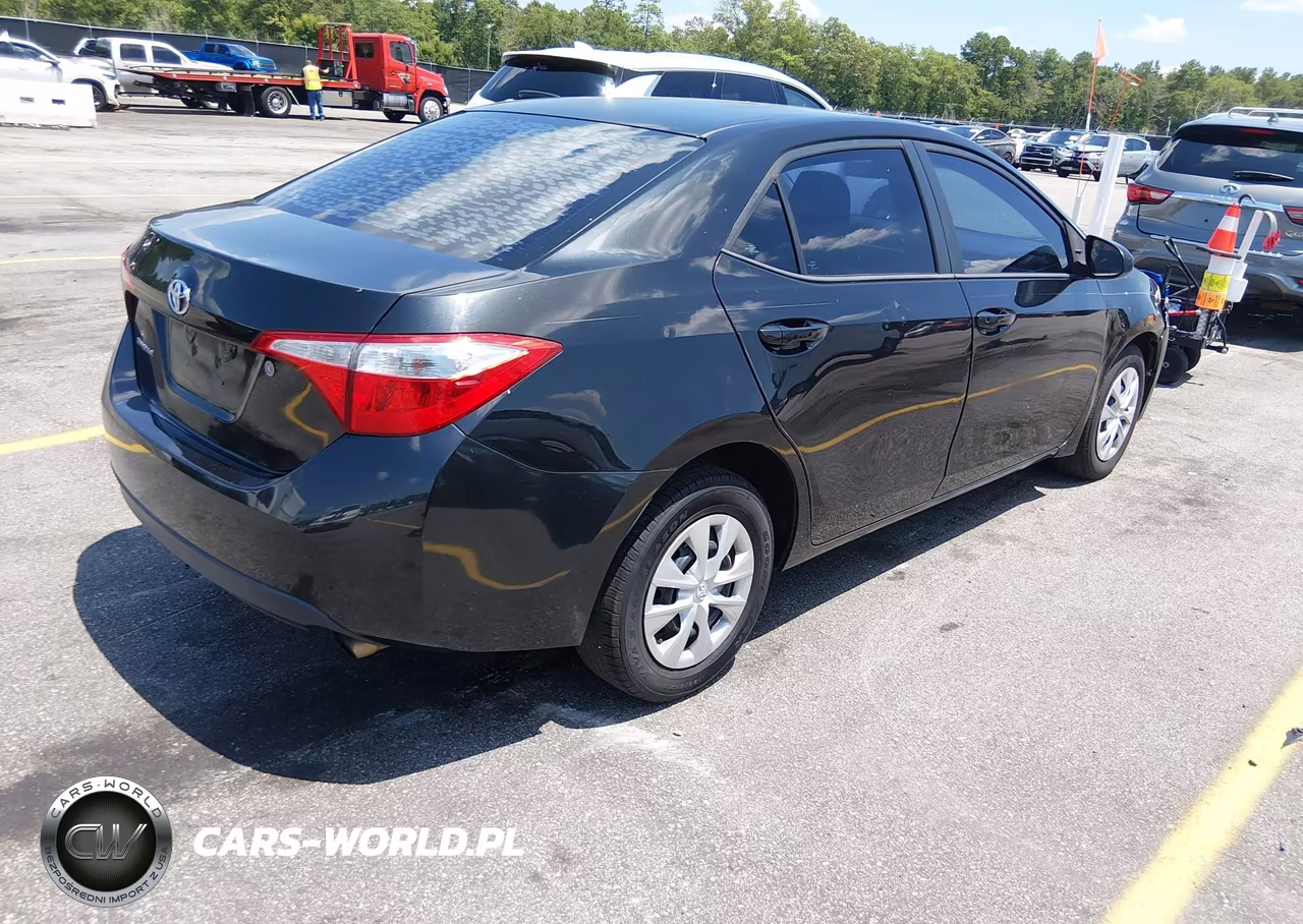 2015 Toyota Corolla L VIN:5YFBURHE2FP257032 - 4