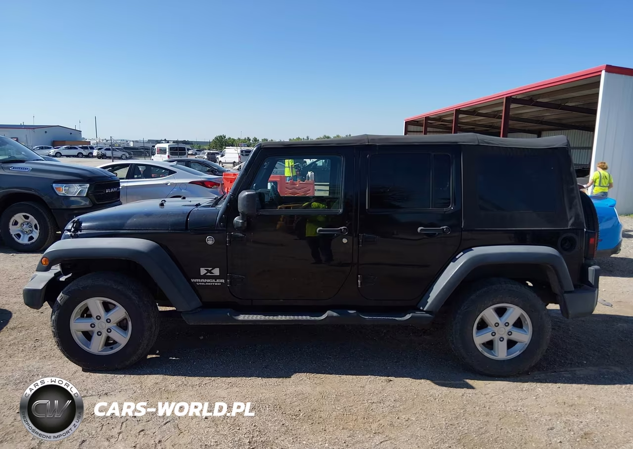 2007 Jeep Wrangler Unlimited X VIN:1J4GA39117L133250 - 14