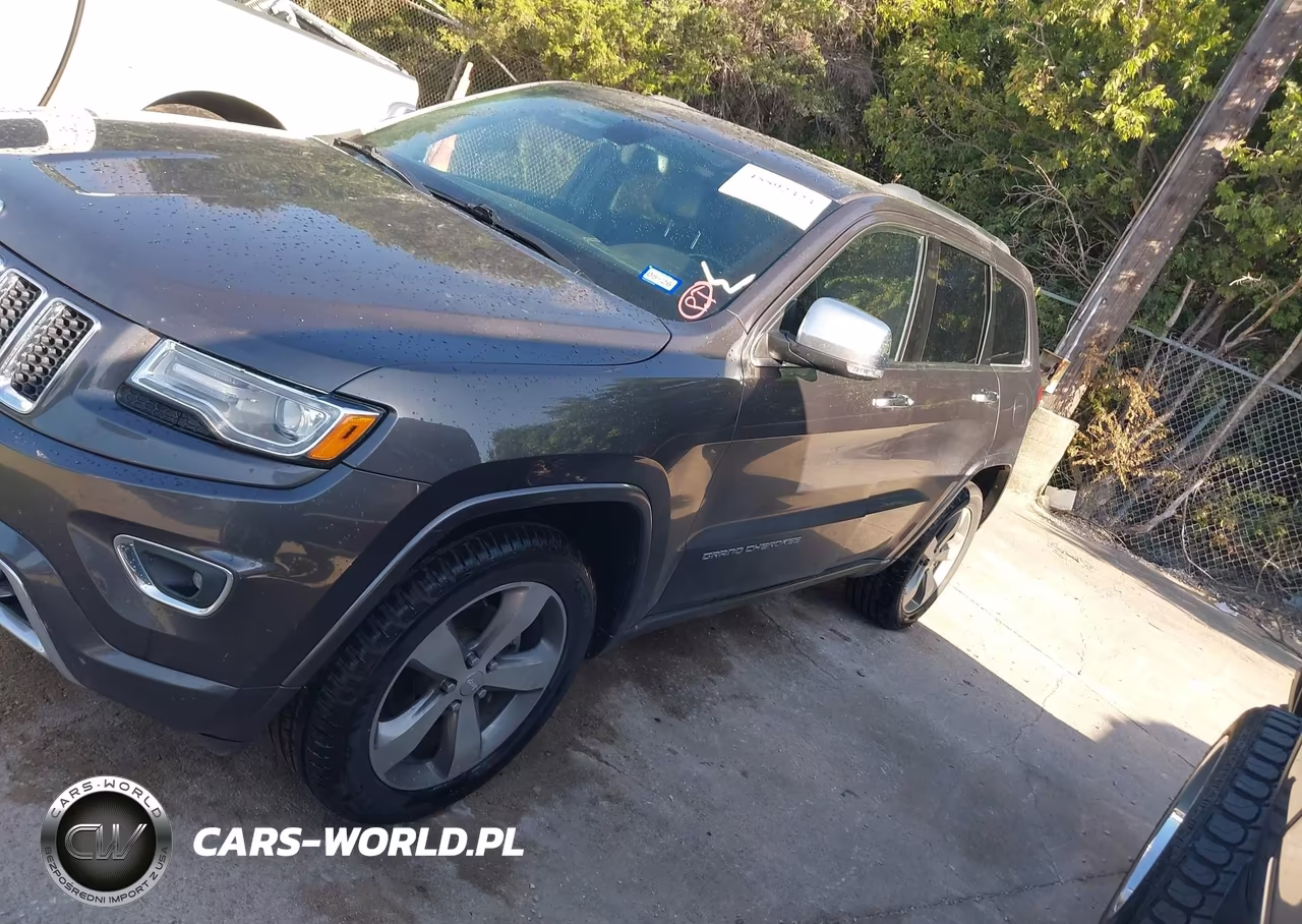 2015 Jeep Grand Cherokee Overland VIN:1C4RJECG8FC856664 - 14