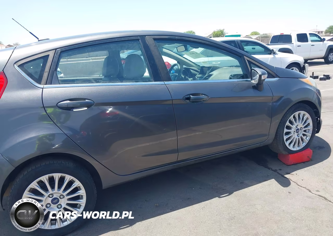 2015 Ford Fiesta Titanium VIN:3FADP4FJ5FM110297 - 13