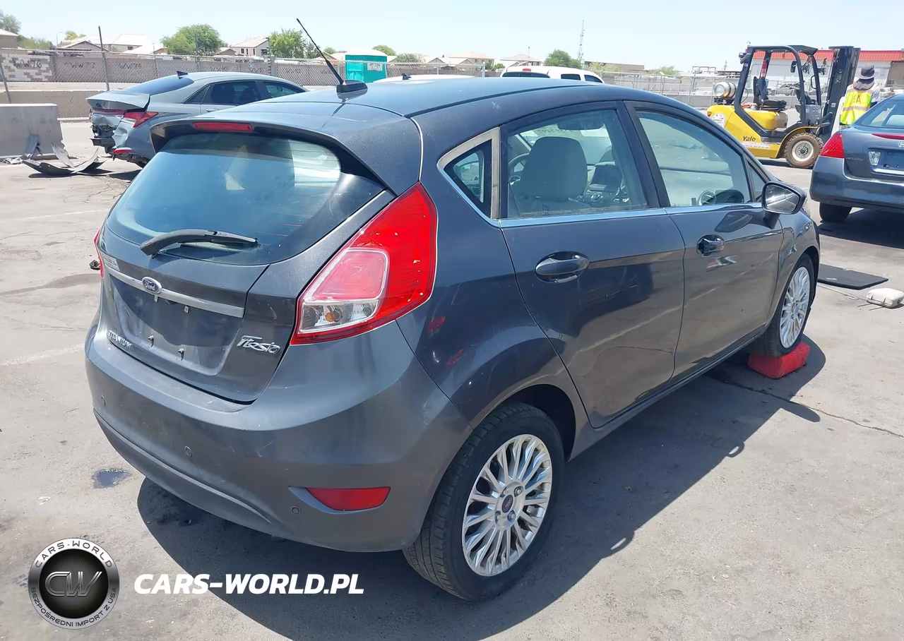 2015 Ford Fiesta Titanium VIN:3FADP4FJ5FM110297 - 4