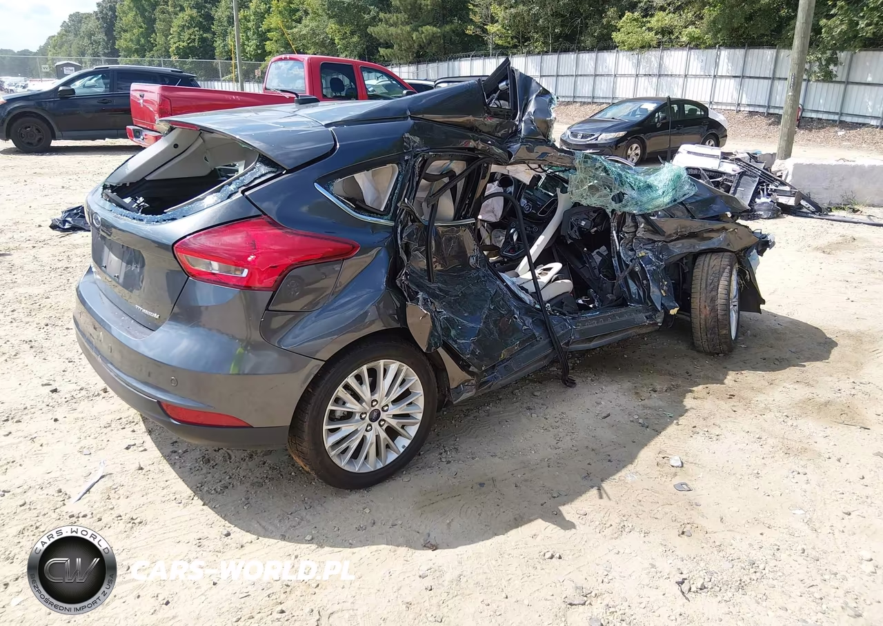 2018 Ford Focus Titanium VIN:1FADP3N20JL314813 - 4