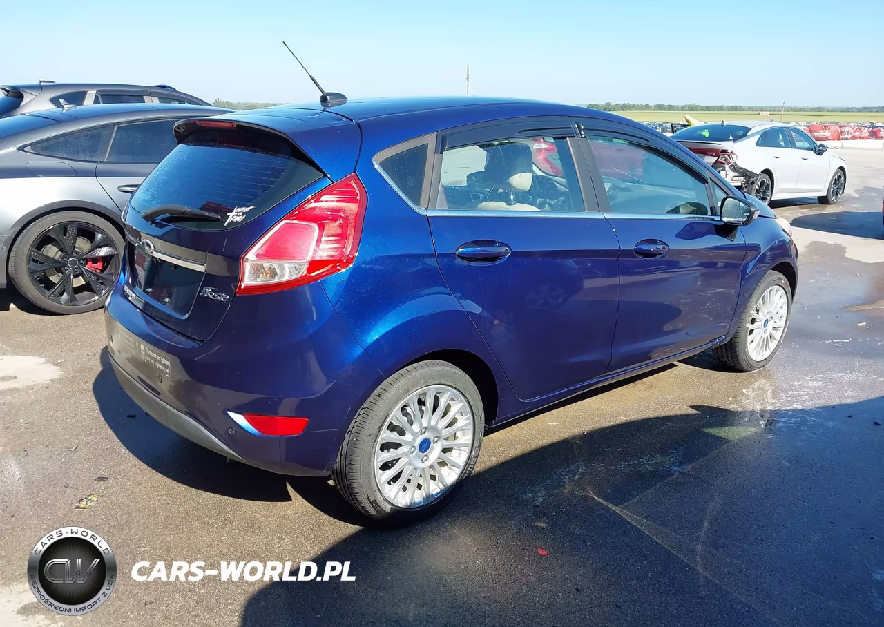 2016 Ford Fiesta Titanium VIN:3FADP4FJ0GM141152 - 4