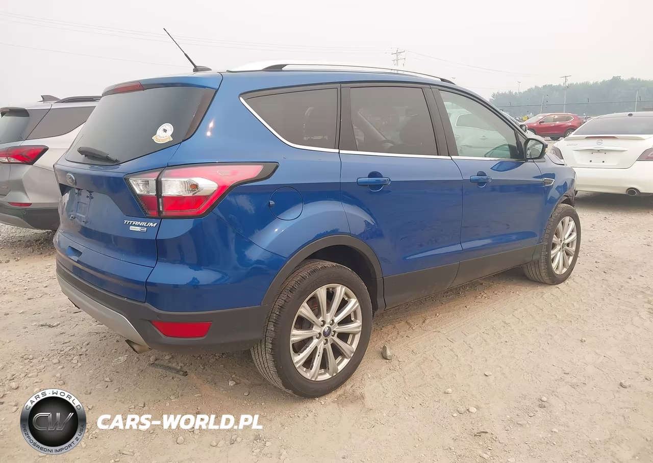 2017 Ford Escape Titanium VIN:1FMCU9JD8HUC93444 - 4