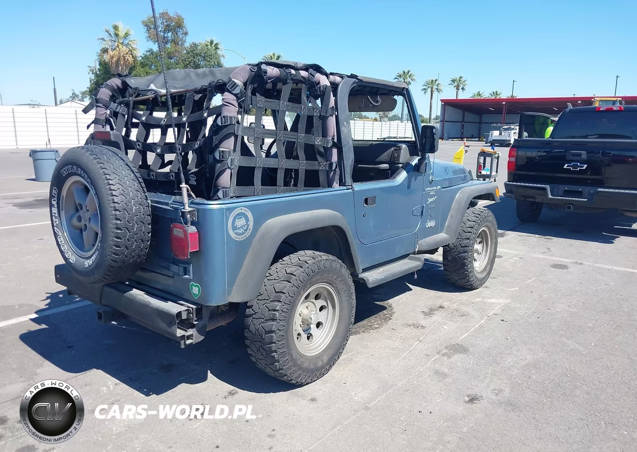 1999 Jeep Wrangler Sport VIN:1J4FY19S2XP408671 - 4