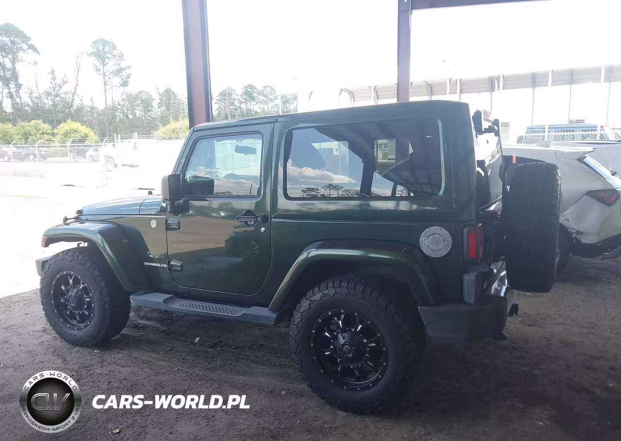 2011 Jeep Wrangler Sahara VIN:1J4AA5D18BL506561 - 14