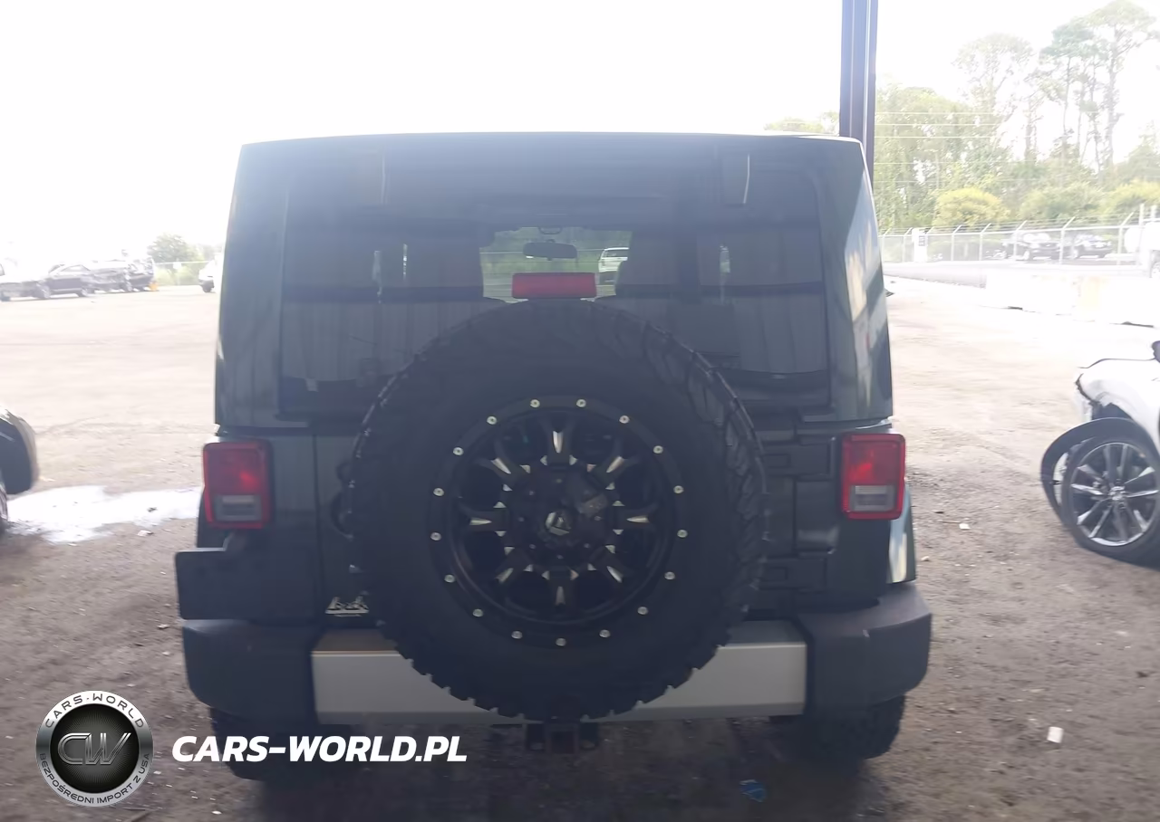 2011 Jeep Wrangler Sahara VIN:1J4AA5D18BL506561 - 16