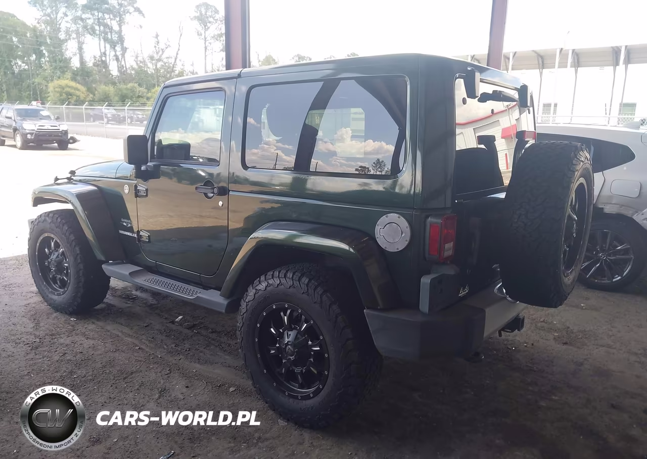 2011 Jeep Wrangler Sahara VIN:1J4AA5D18BL506561 - 3