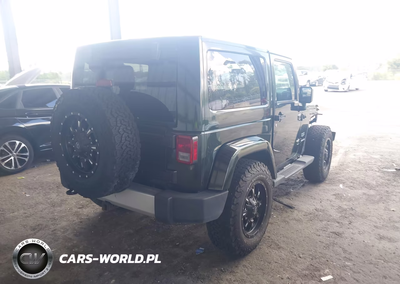 2011 Jeep Wrangler Sahara VIN:1J4AA5D18BL506561 - 4