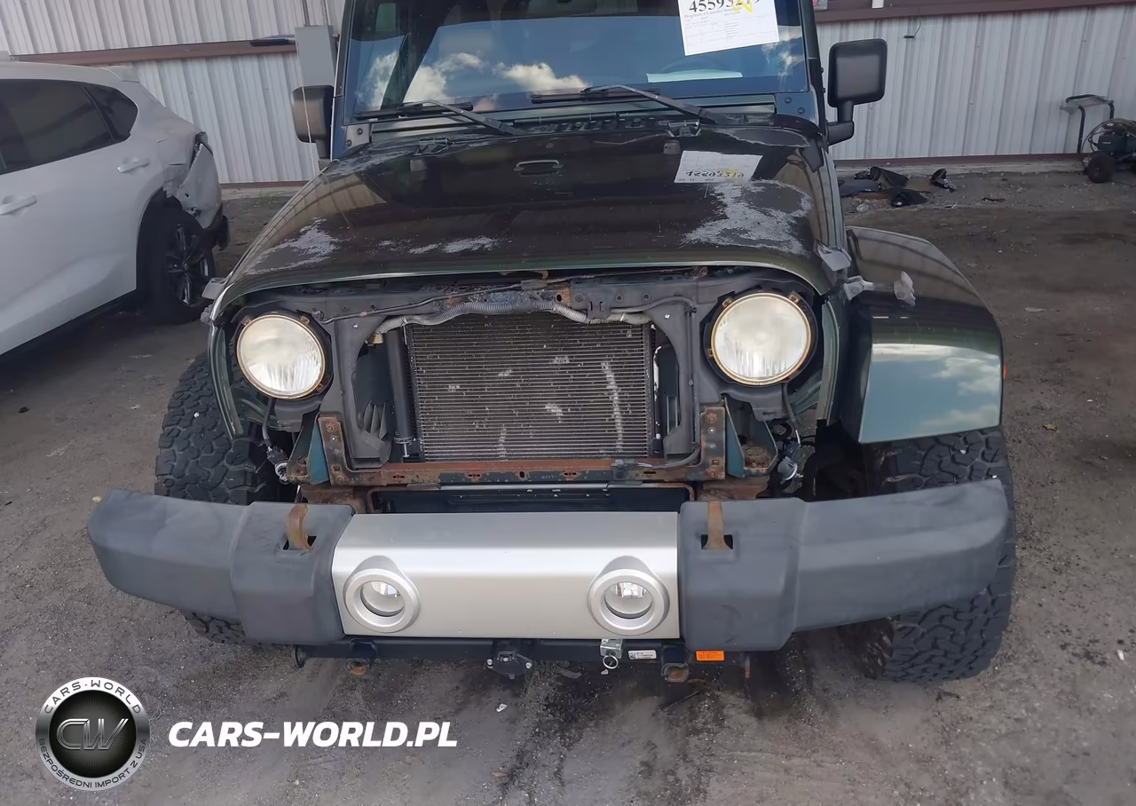 2011 Jeep Wrangler Sahara VIN:1J4AA5D18BL506561 - 6