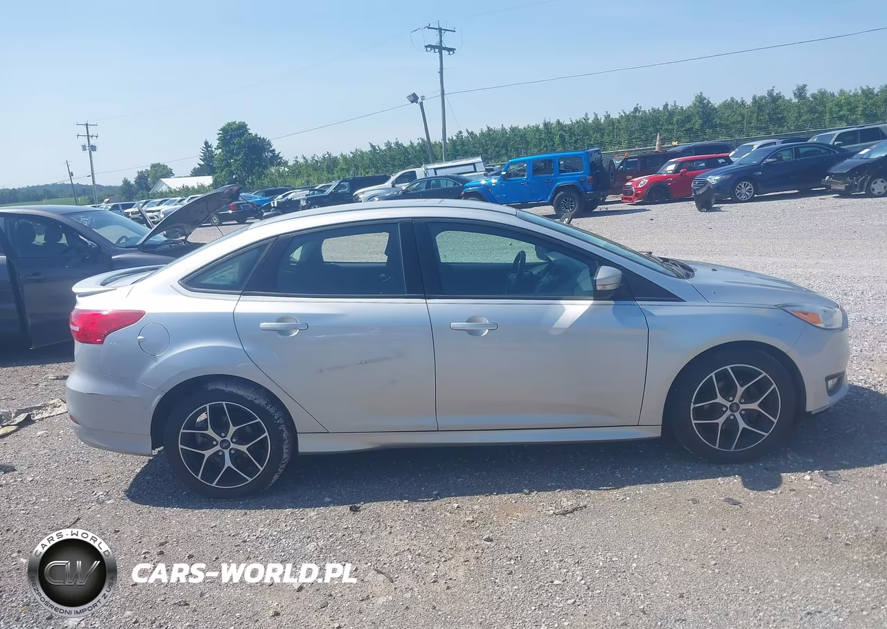 2016 Ford Focus Se VIN:1FADP3F24GL292354 - 12
