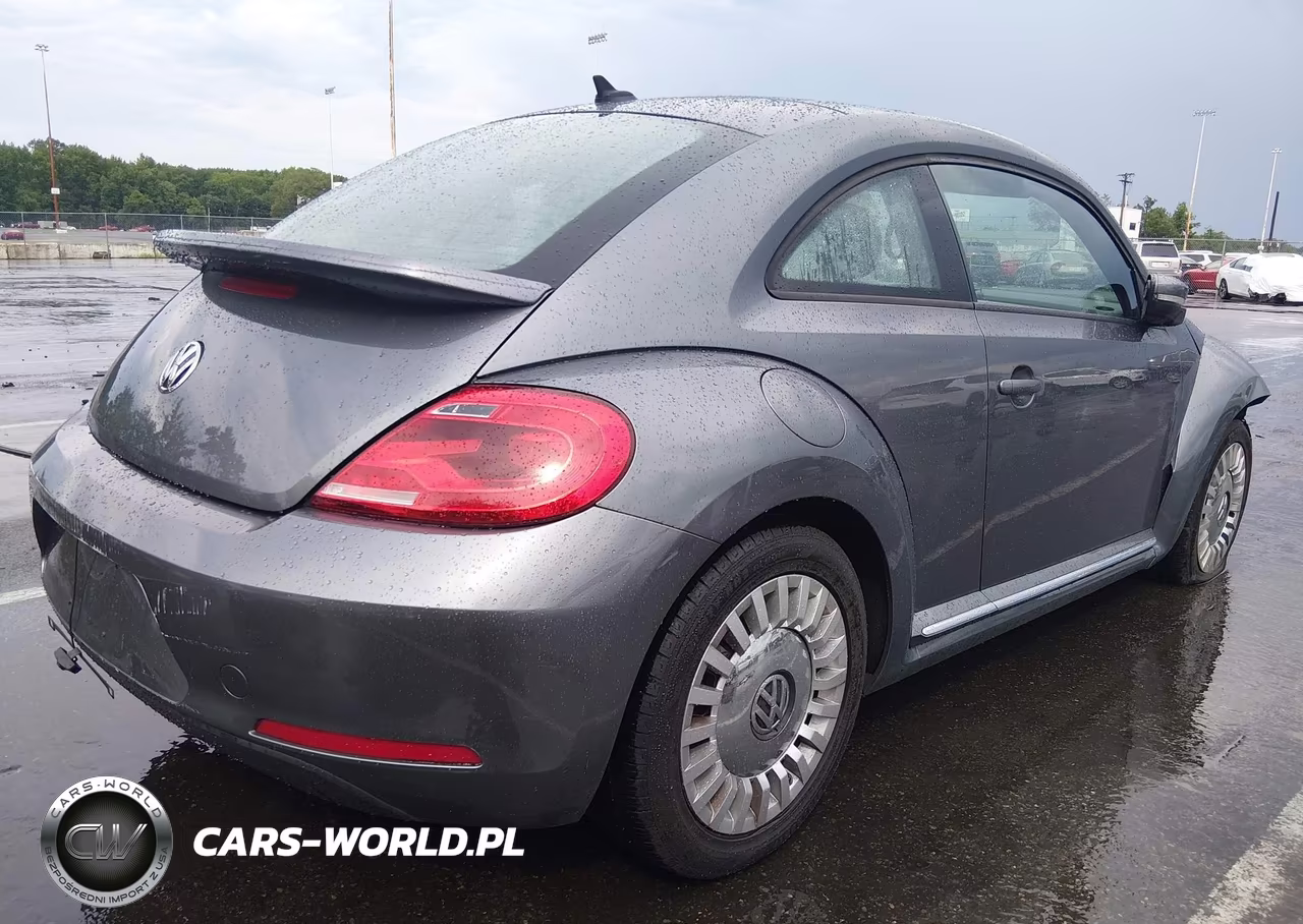 2014 Volkswagen Beetle 2.5L VIN:3VWJP7AT1EM630953 - 4