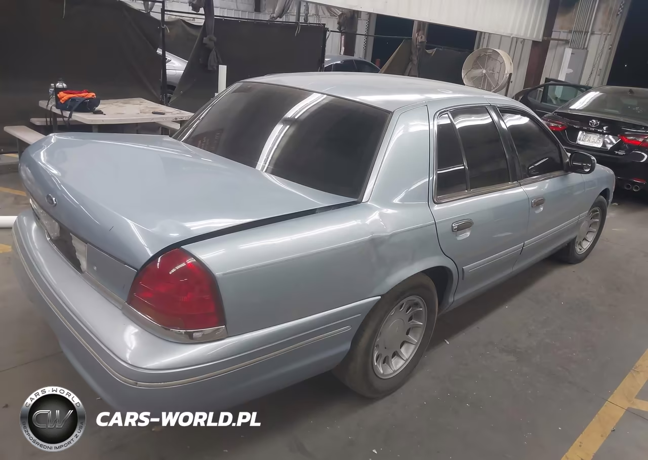 2002 Ford Crown Victoria Lx VIN:2FAFP74W02X159611 - 4