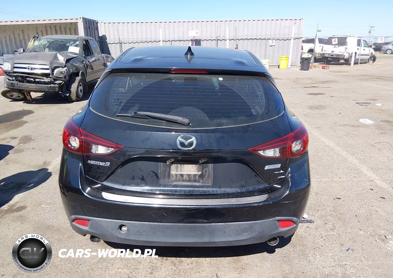 2014 Mazda Mazda3 I Touring VIN:JM1BM1L71E1213942 - 16
