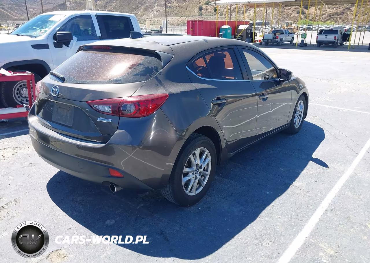 2014 Mazda Mazda3 I Grand Touring VIN:JM1BM1M76E1102396 - 4