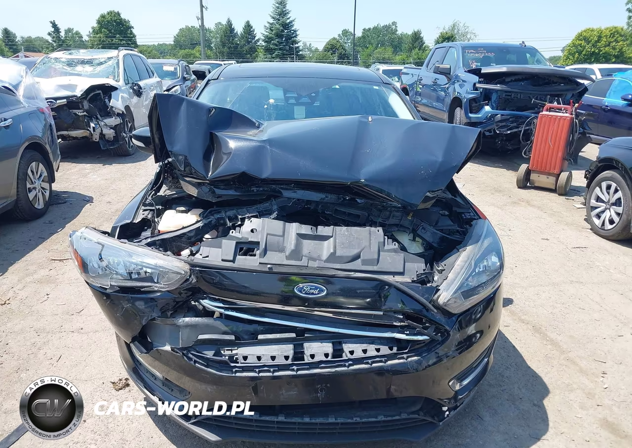 2017 Ford Focus Titanium VIN:1FADP3N22HL324821 - 12