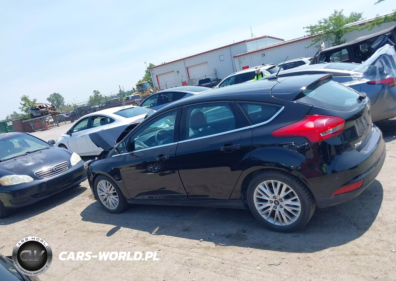 2017 Ford Focus Titanium VIN:1FADP3N22HL324821 - 14