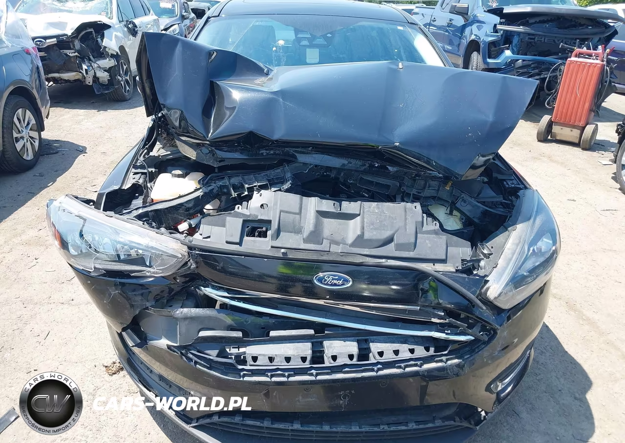 2017 Ford Focus Titanium VIN:1FADP3N22HL324821 - 6