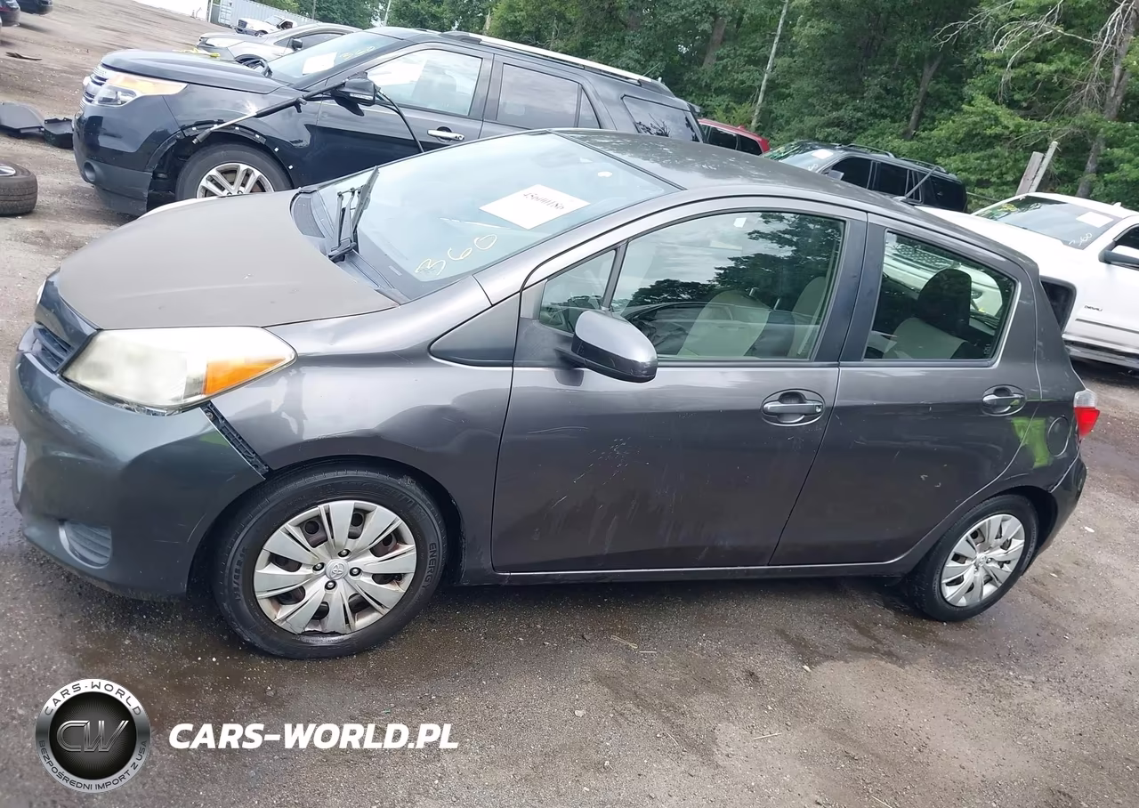 2012 Toyota Yaris Le VIN:JTDKTUD37CD538414 - 14