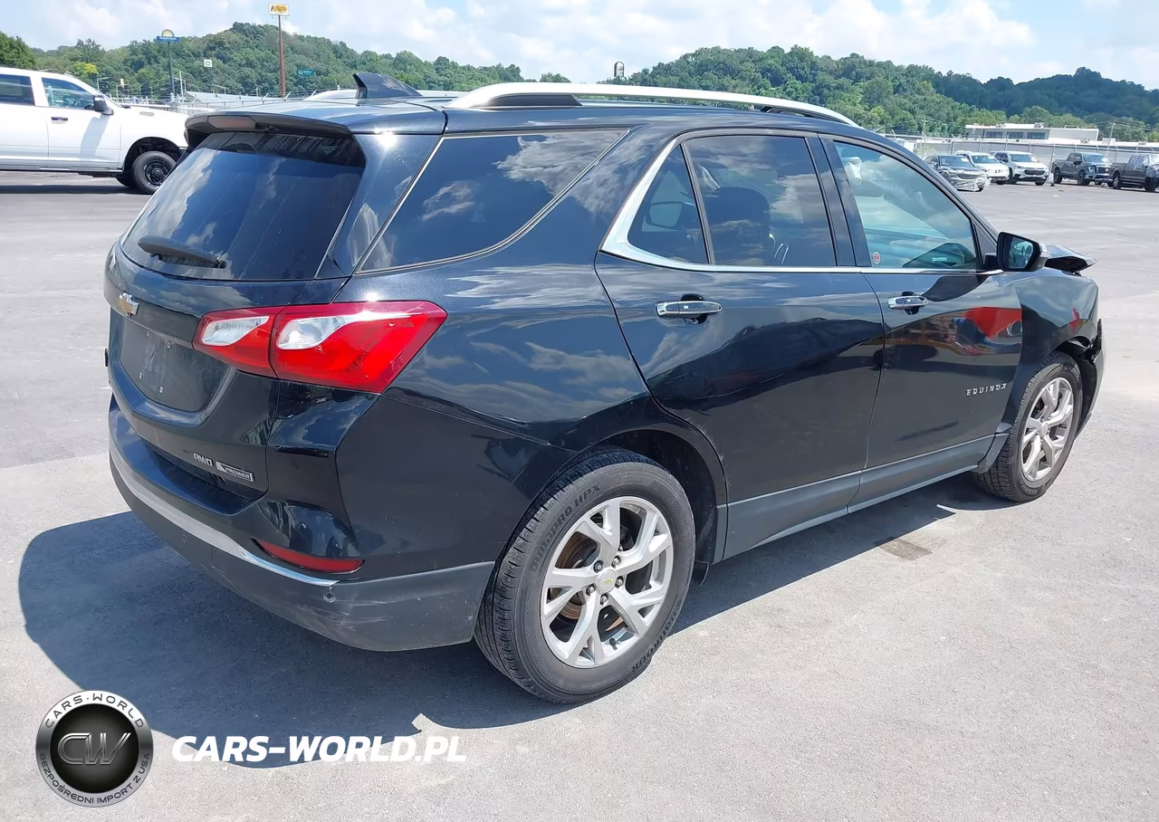 2018 Chevrolet Equinox Premier VIN:2GNAXVEV6J6184796 - 4
