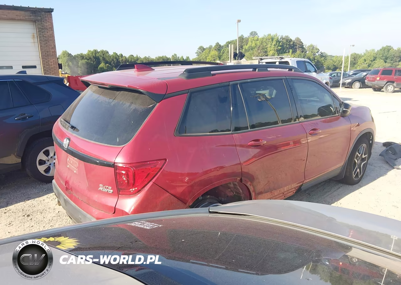 2023 Honda Passport Awd Elite VIN:5FNYF8H05PB010801 - 4