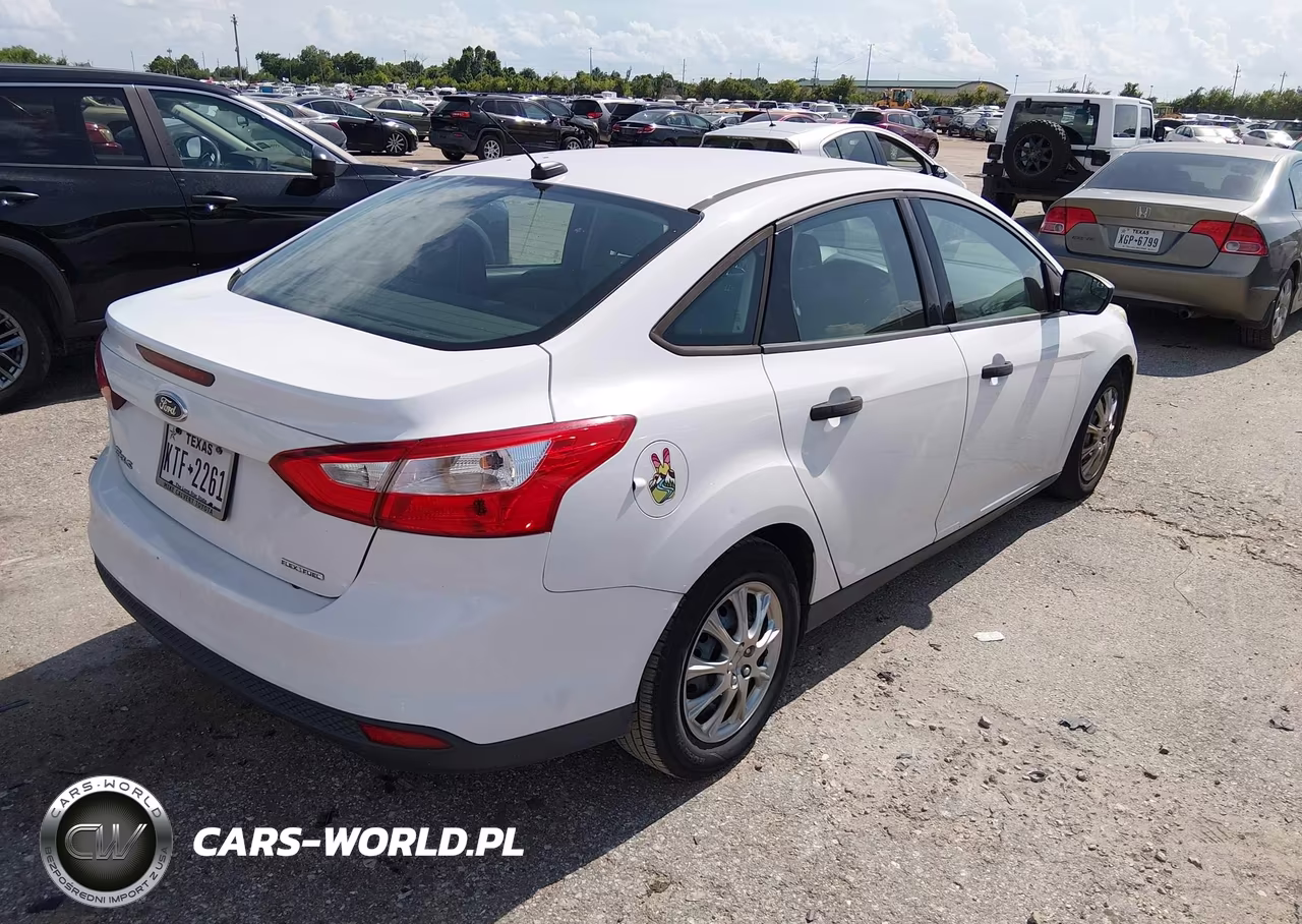 2013 Ford Focus S VIN:1FADP3E27DL297495 - 4