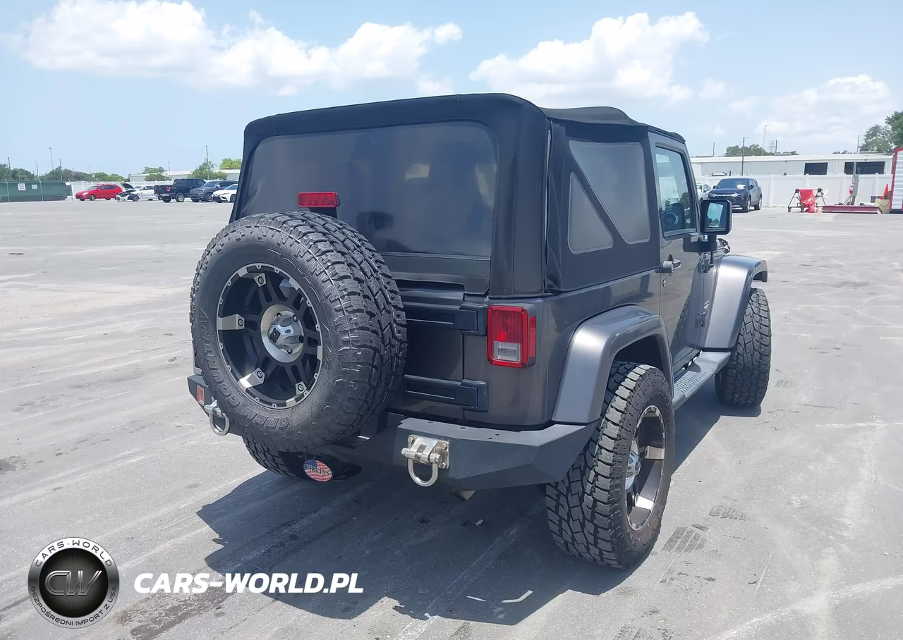 2014 Jeep Wrangler Sahara VIN:1C4GJWBG4EL266488 - 4