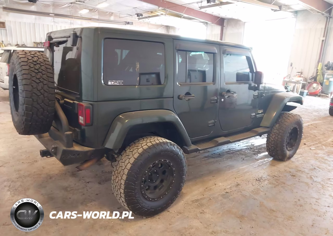 2011 Jeep Wrangler Unlimited Sahara VIN:1J4BA5H12BL576684 - 4