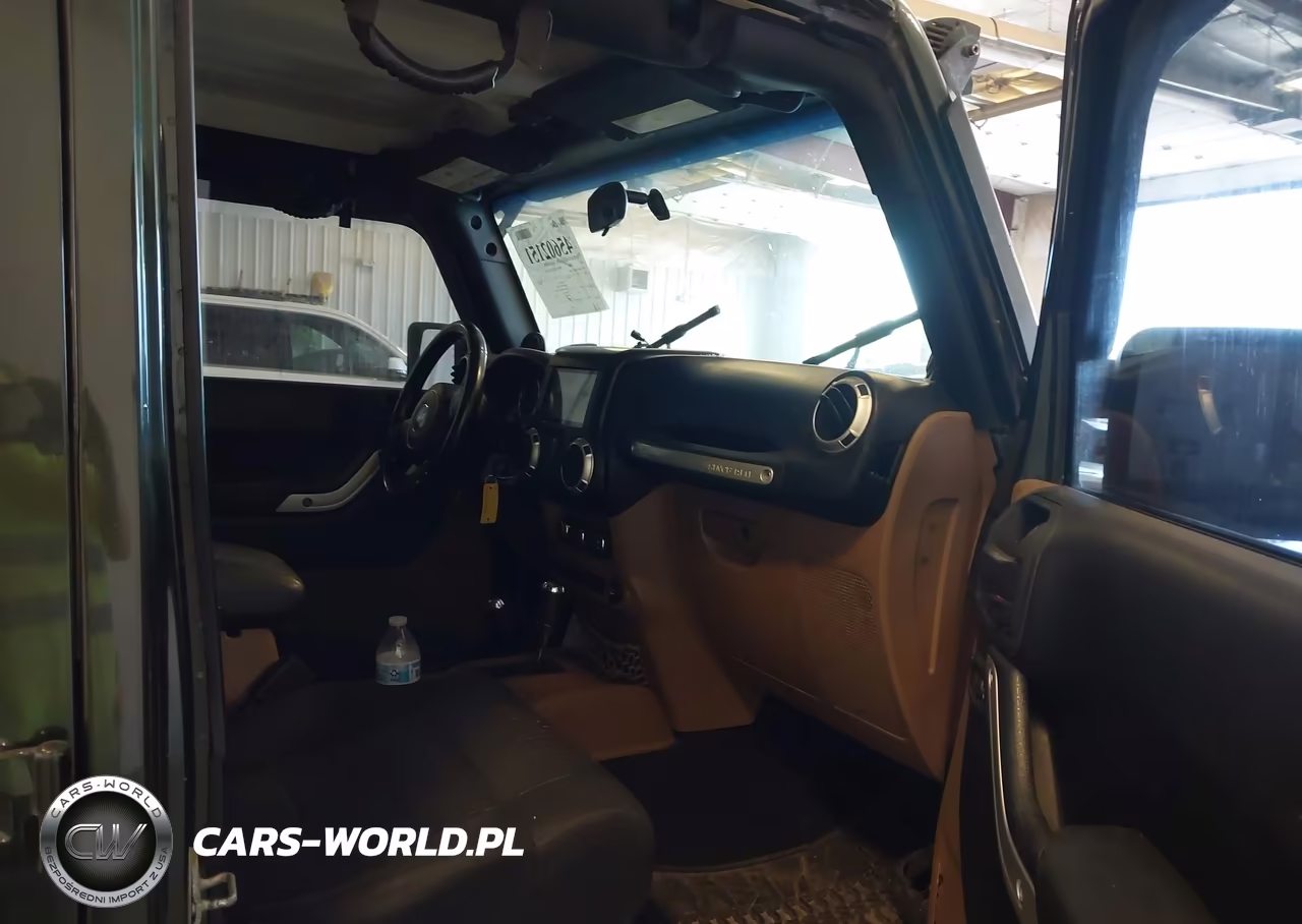 2011 Jeep Wrangler Unlimited Sahara VIN:1J4BA5H12BL576684 - 5