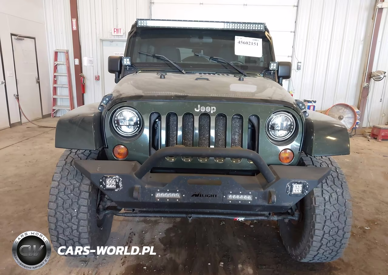 2011 Jeep Wrangler Unlimited Sahara VIN:1J4BA5H12BL576684 - 6