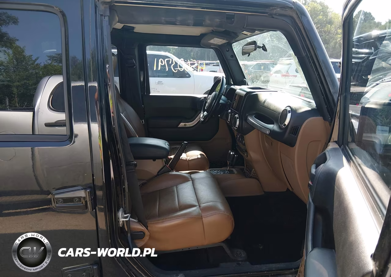2012 Jeep Wrangler Unlimited Sahara VIN:1C4BJWEG8CL104012 - 5