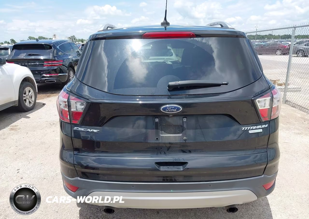 2018 Ford Escape Titanium VIN:1FMCU0J97JUD49869 - 16